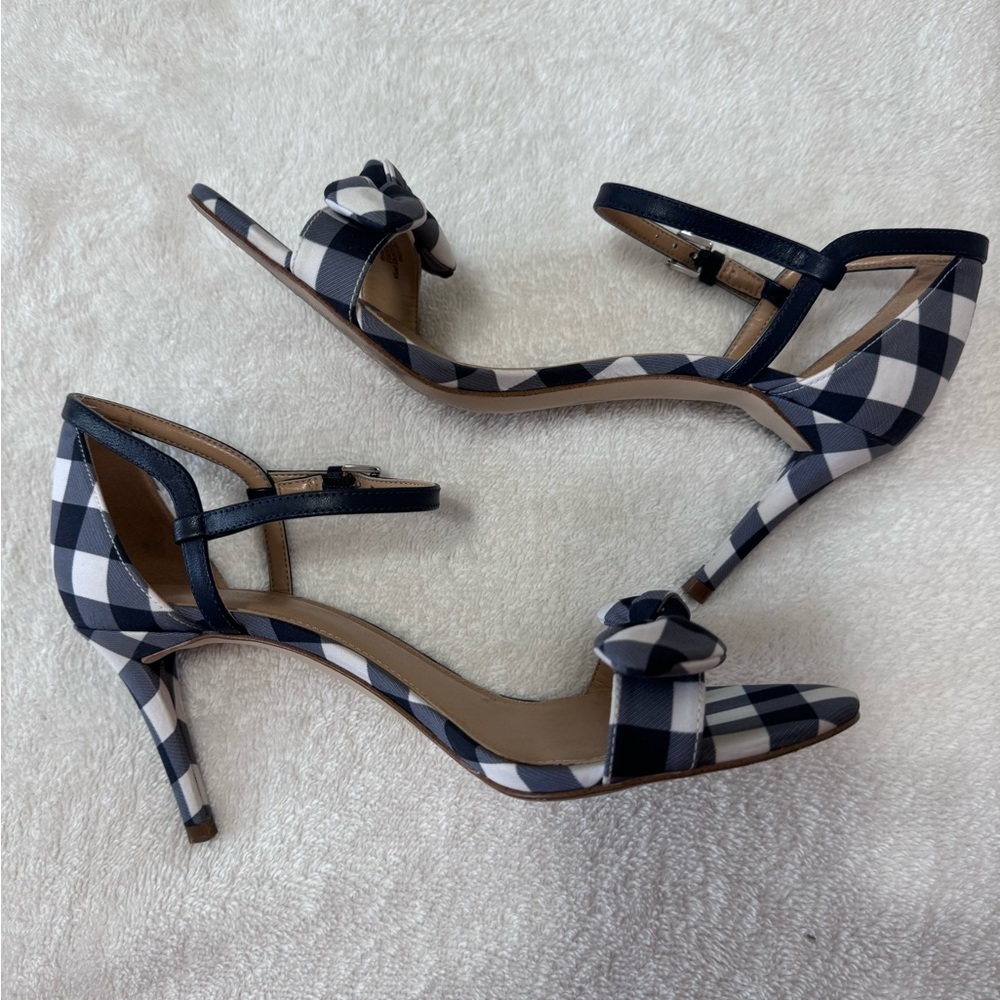 Michael Kors women’s Pippa leather open toe shoes.
